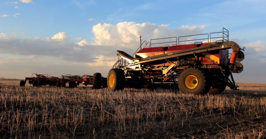 A tractor seeding a field.